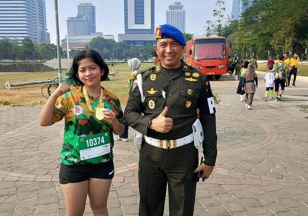 JENI NUR AINI Menuntaskan 10K Pertama di TNI Run 2026