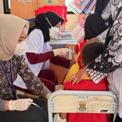 PUSKESMAS GUNUNG KALER – LAKSANAKAN BULAN IMUNISASI ANAK SEKOLAH (BIAS)