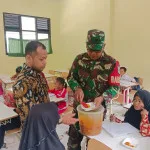 Tingkatkan Semangat Belajar Siswa, Kodim 0602/Serang Berikan Makanan Tambahan Untuk Anak Sekolah