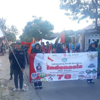 Peringati HUT ke-78 RI, Warga Desa Gemilang Puncu Gelar Kirab Merah Putih Sepanjang 100 Meter
