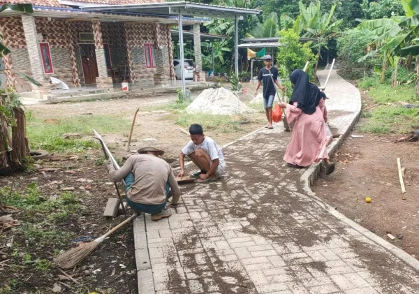 DPRKP Banten Selesaikan Pembangunan Jalan Paving Block di Kampung Kadugenep