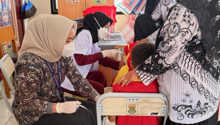 PUSKESMAS GUNUNG KALER – LAKSANAKAN BULAN IMUNISASI ANAK SEKOLAH (BIAS)